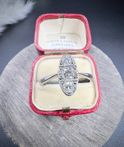 Antique Art Deco Platinum Three Stone Oval Shaped Diamond Ring, Circa 1920