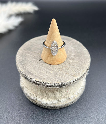 Antique Art Deco Platinum Three Stone Oval Shaped Diamond Ring, Circa 1920