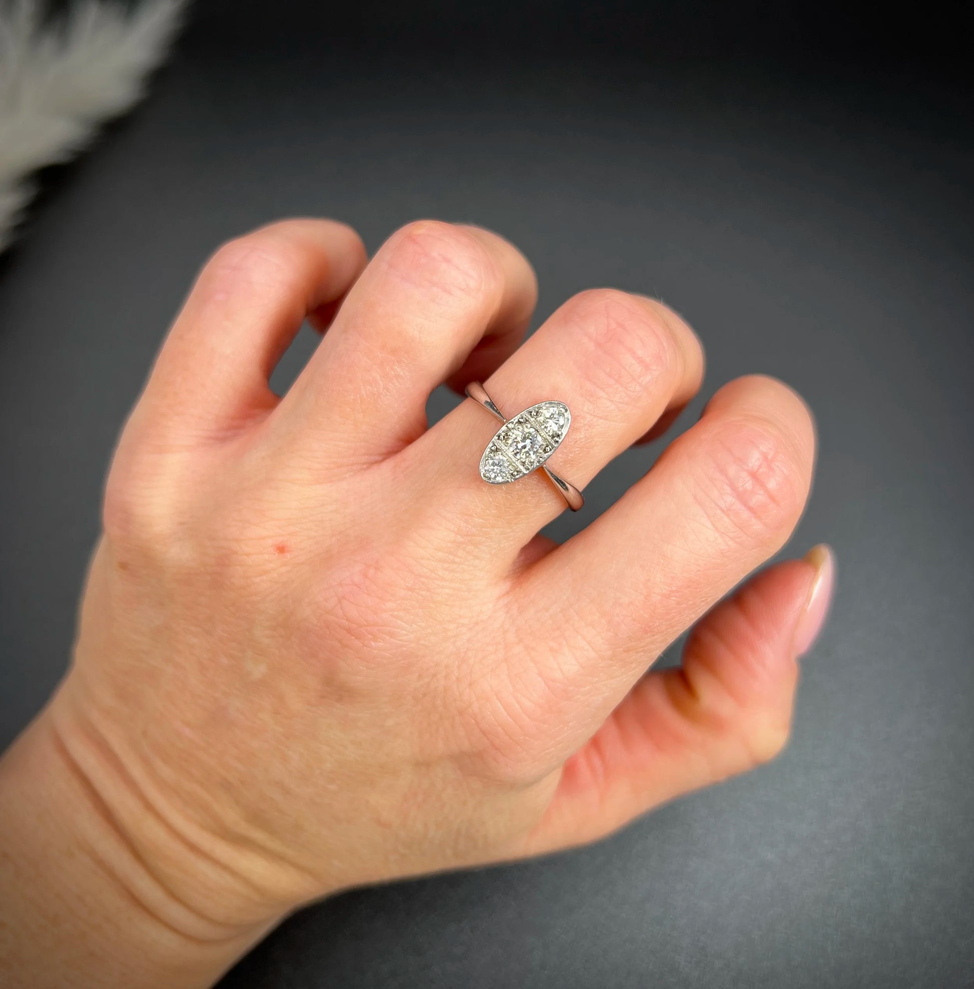 Antique Art Deco Platinum Three Stone Oval Shaped Diamond Ring, Circa 1920