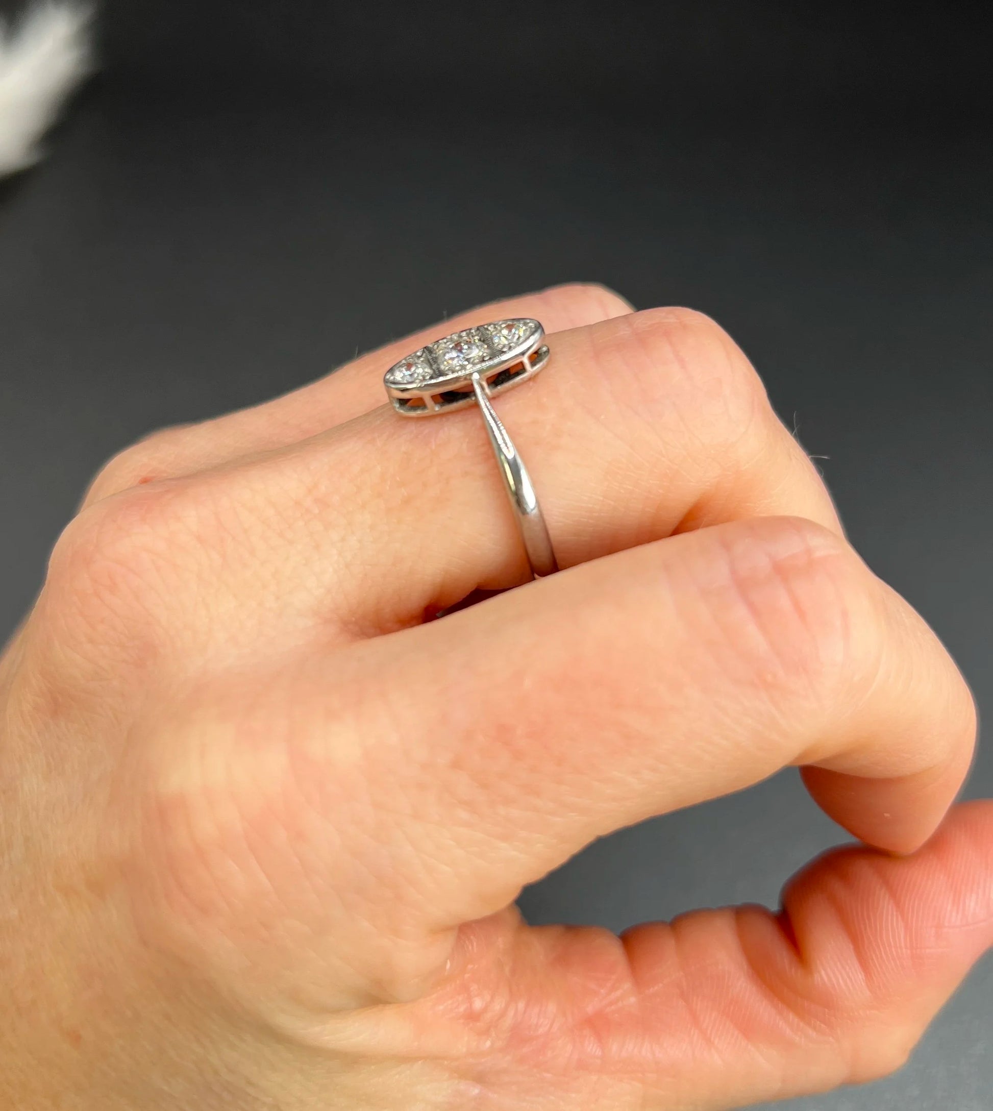 Antique Art Deco Platinum Three Stone Oval Shaped Diamond Ring, Circa 1920