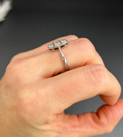 Antique Art Deco Platinum Three Stone Oval Shaped Diamond Ring, Circa 1920