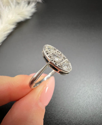 Antique Art Deco Platinum Three Stone Oval Shaped Diamond Ring, Circa 1920