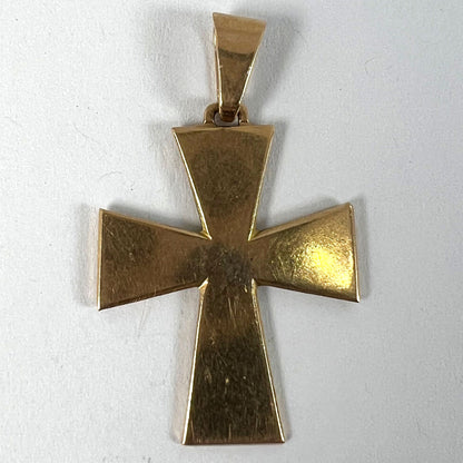 A plain gold cross pendant, on a white background