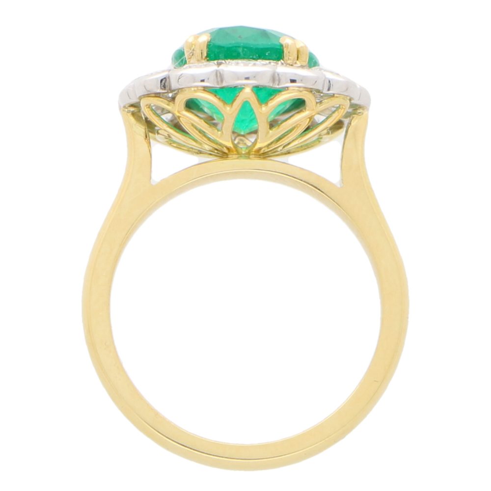 3.96ct Oval Cut Emerald and Diamond Cluster Ring