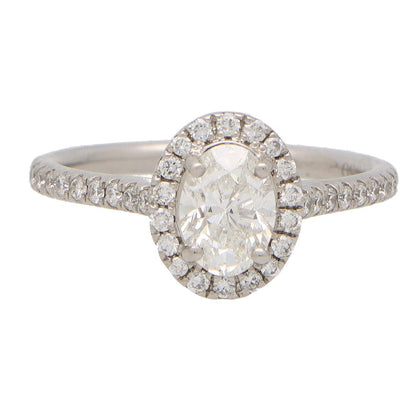 GIA Certified 0.70 Oval Brilliant Cut Diamond Engagement Ring, the diamond halo cluster design, F in colour with VS2 clarity, Platinum