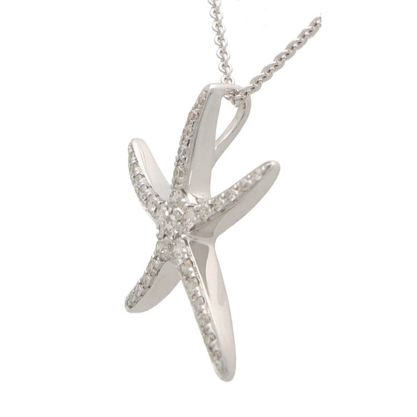 Diamond starfish pendant necklace in white gold.
