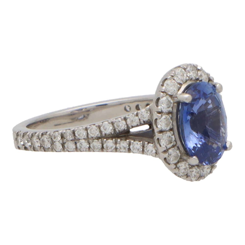 Vintage sapphire and diamond cluster ring in white gold.