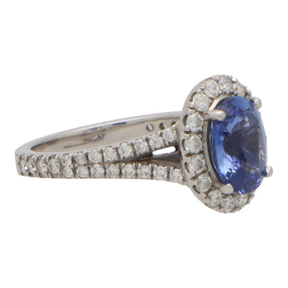 Vintage sapphire and diamond cluster ring in white gold.