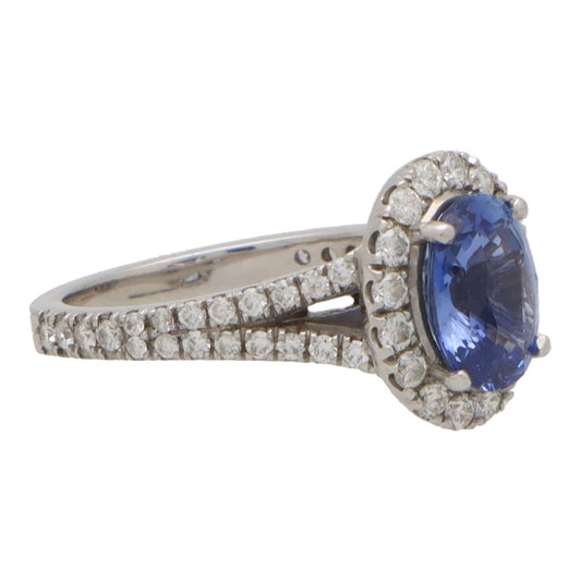 Vintage sapphire and diamond cluster ring in white gold.