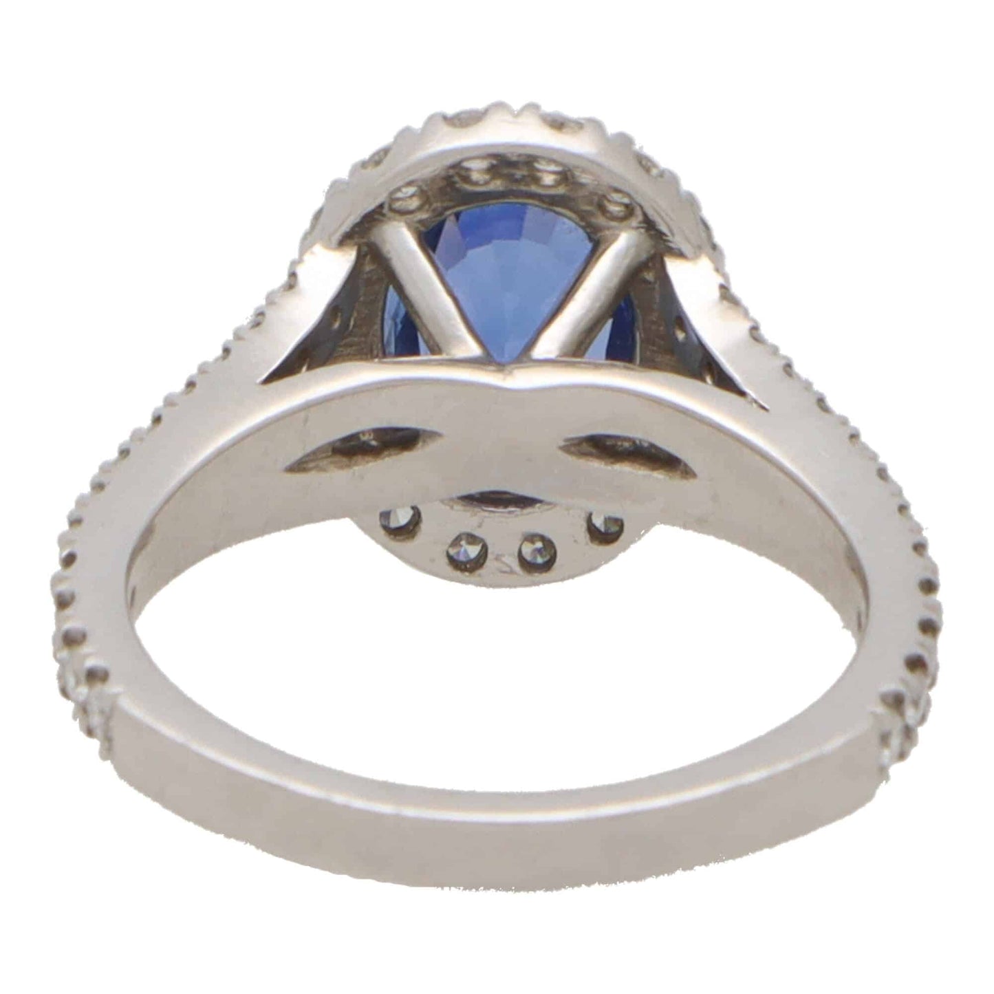 Vintage sapphire and diamond cluster ring in white gold.