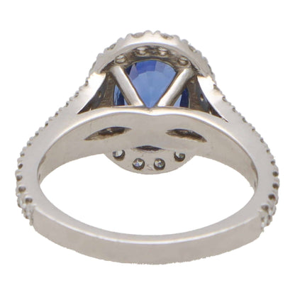 Vintage sapphire and diamond cluster ring in white gold.