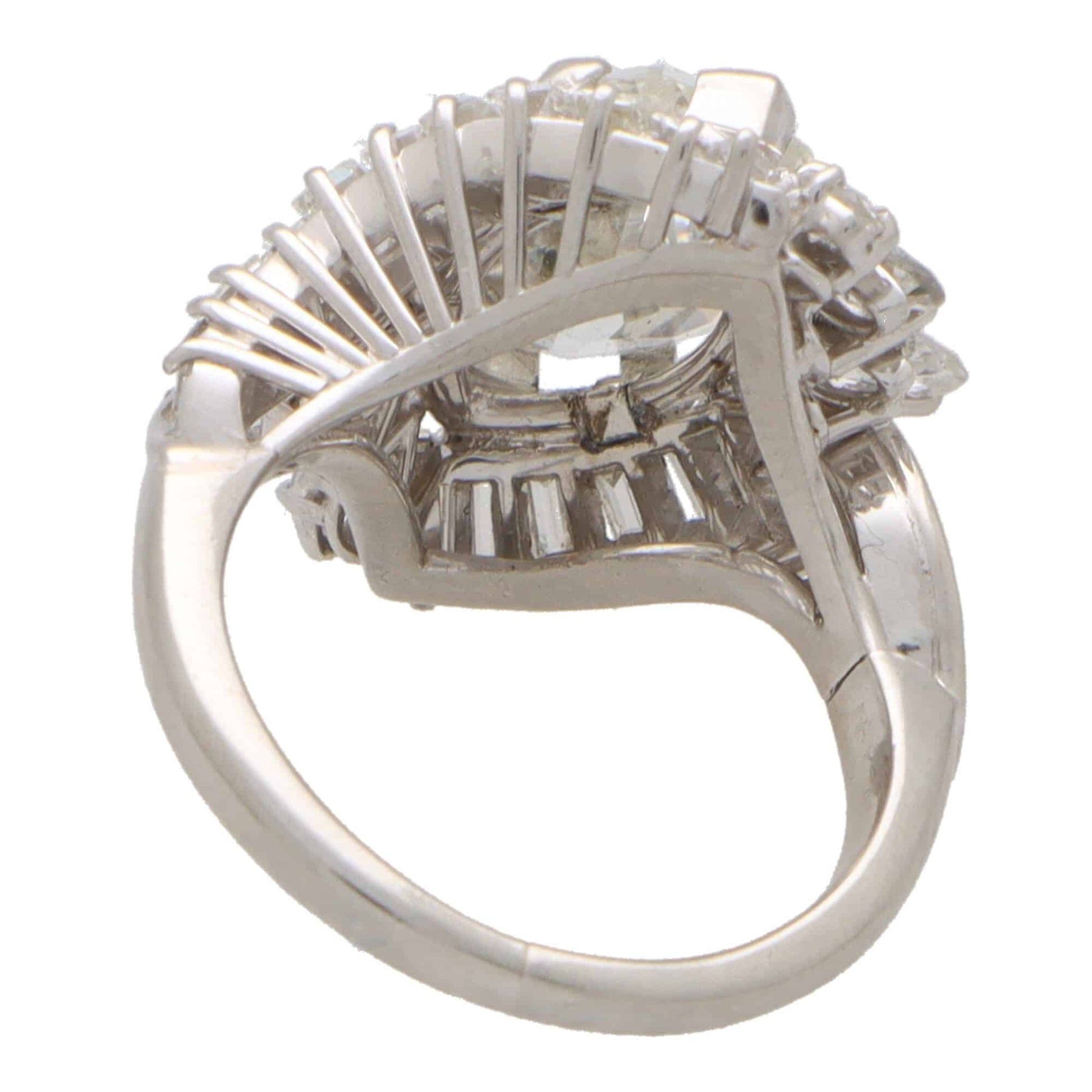 Vintage old marquise cut 4.43 carat diamond cluster ring set in platinum.