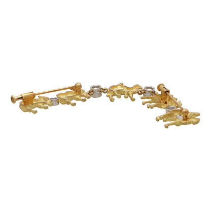 Ikeda Keiko diamond camel brooch in yellow gold and platinum.