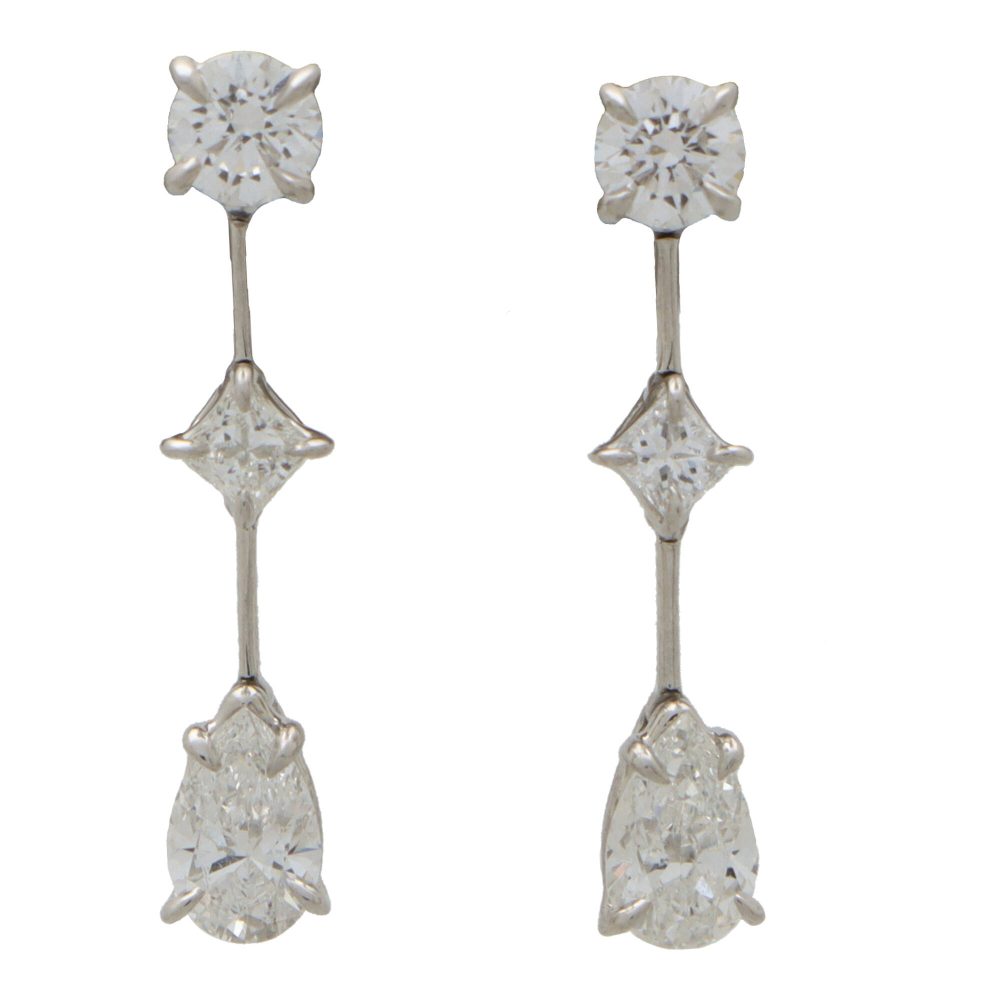 Cascading diamond drop earrings in platinum.