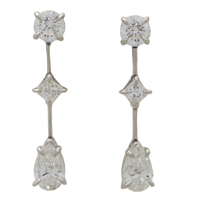 Cascading diamond drop earrings in platinum.