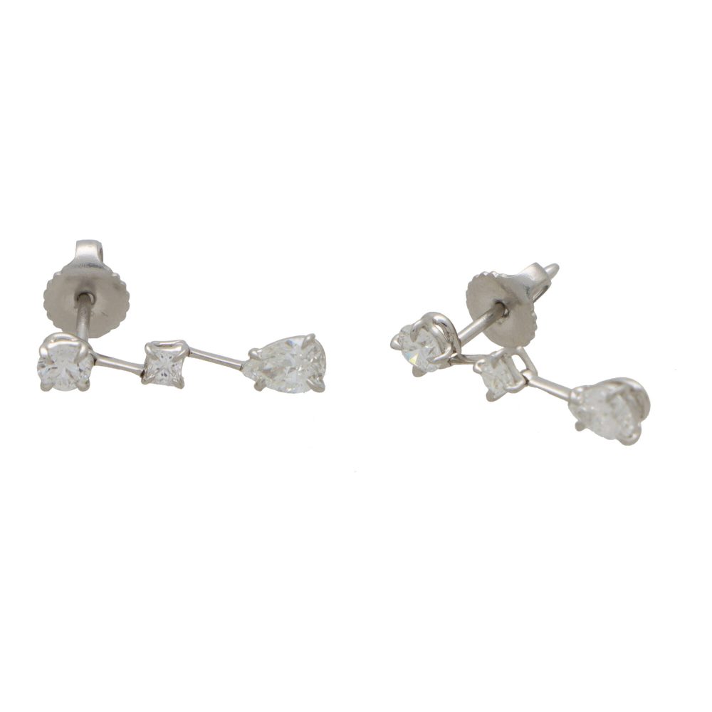 Cascading diamond drop earrings in platinum.