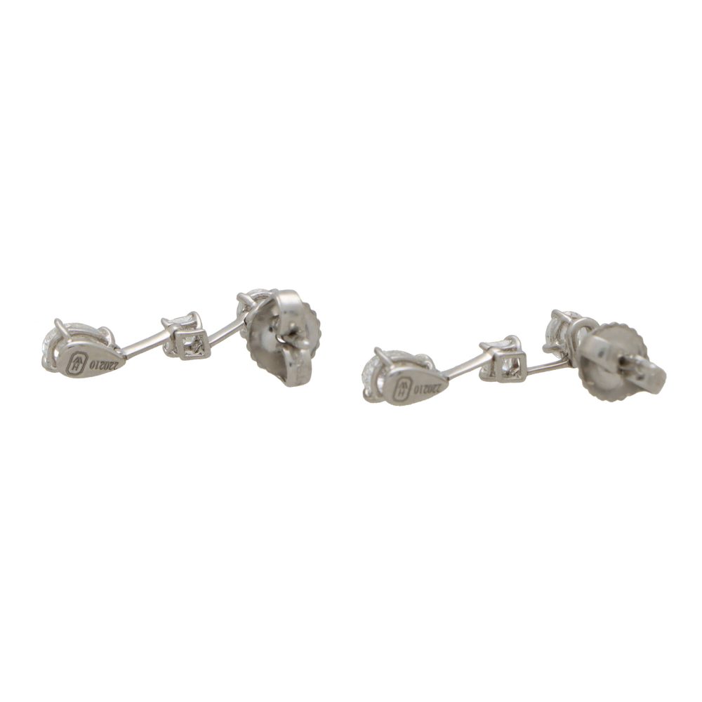 Cascading diamond drop earrings in platinum.