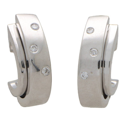 Piaget diamond hoop earrings in white gold.