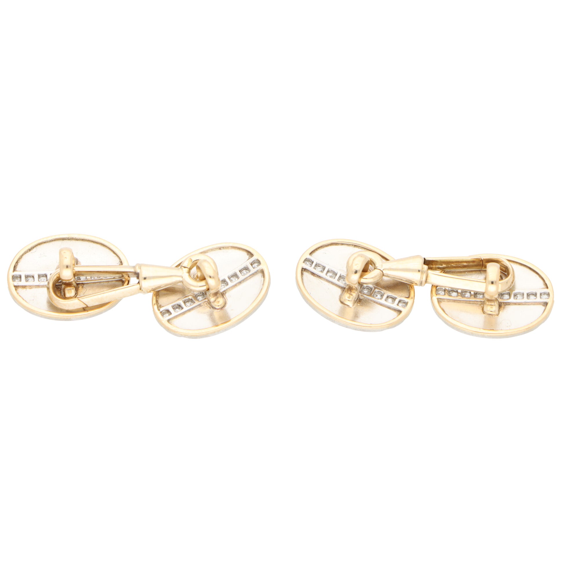 A pair of yellow gold oval cufflinks, on a white background