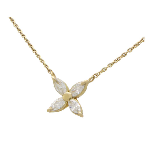A yellow gold marquise cut diamond pendant necklace, on a white background