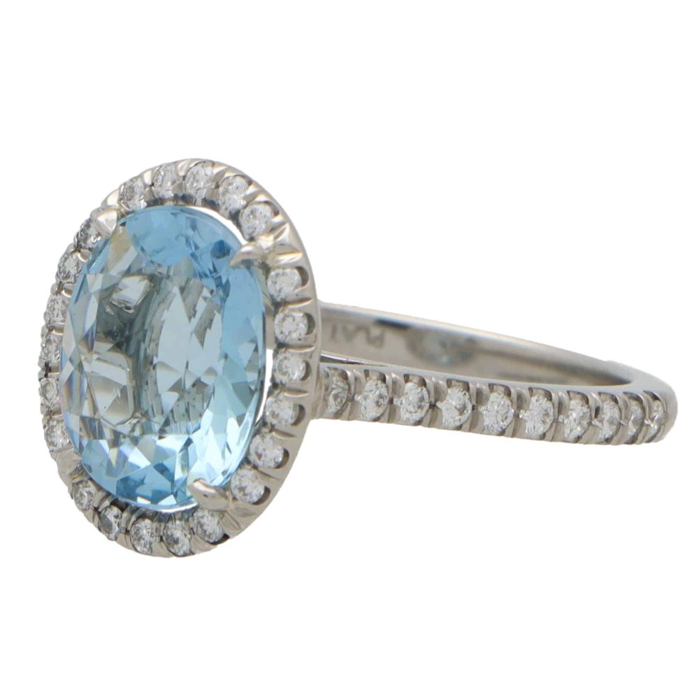 2.30ct Oval Aquamarine and Diamond Halo Cluster Engagement Ring in Platinum
