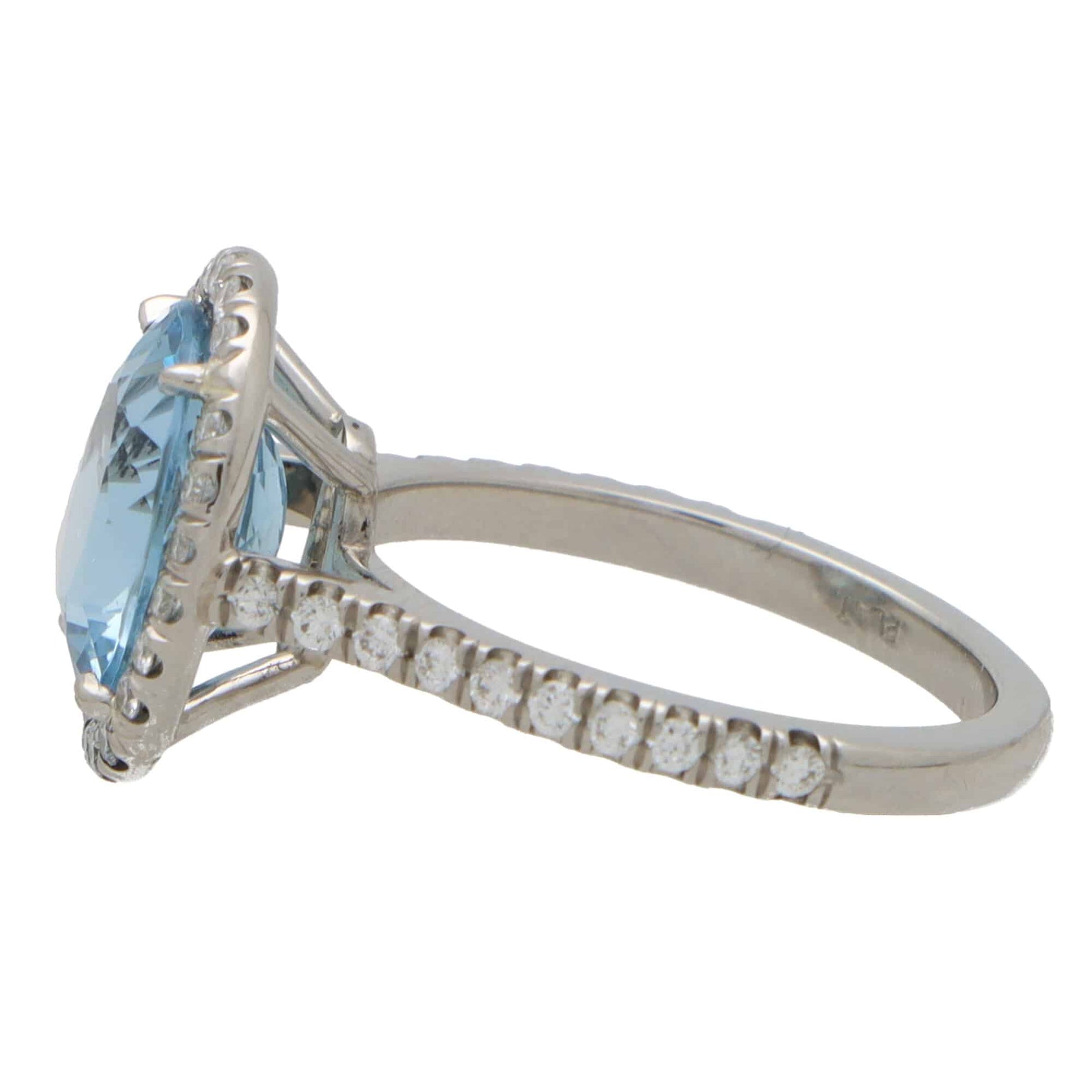 2.30ct Oval Aquamarine and Diamond Halo Cluster Engagement Ring in Platinum