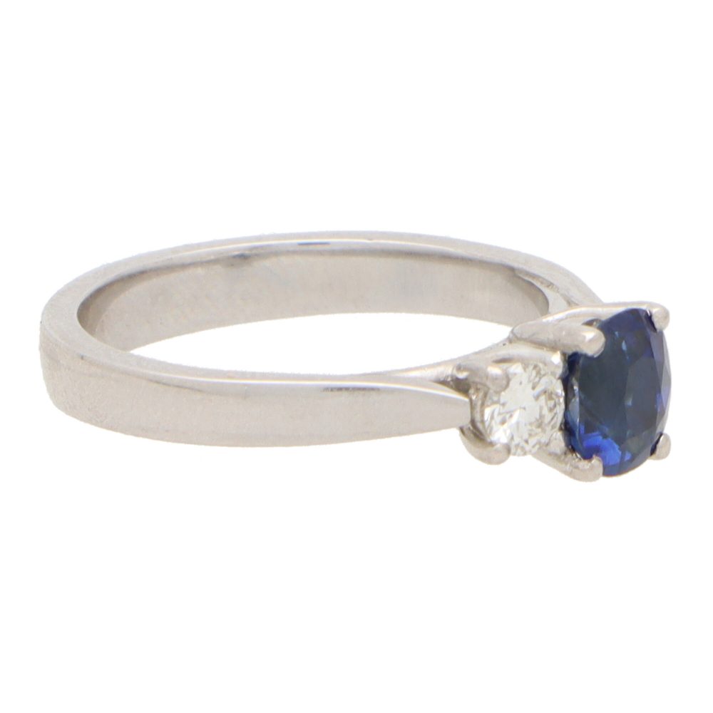 0.65ct Sapphire and Diamond Three Stone Ring in Platinum