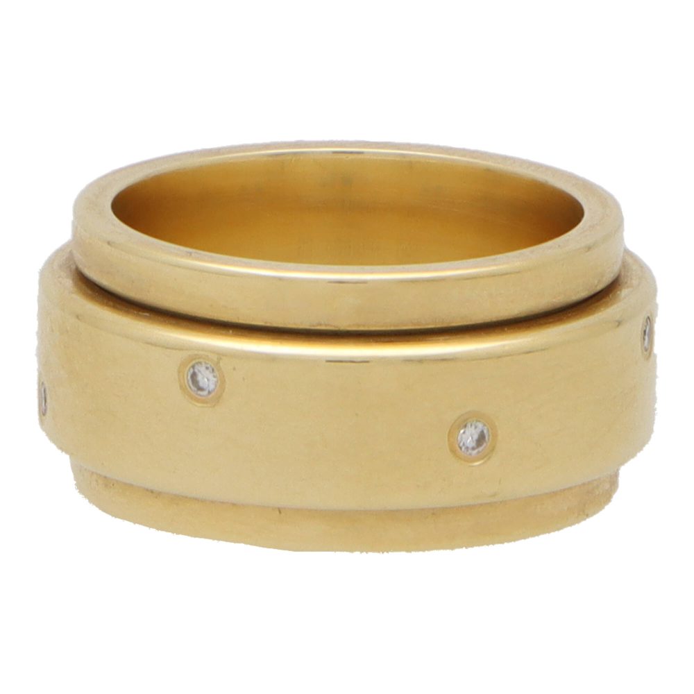 Piaget diamond band ring set in yellow gold.