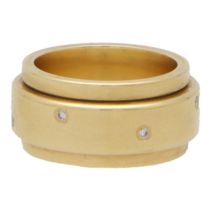 Piaget diamond band ring set in yellow gold.