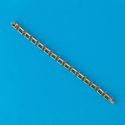 Mouboussin Cabochon Turquoise Set Gold Bracelet