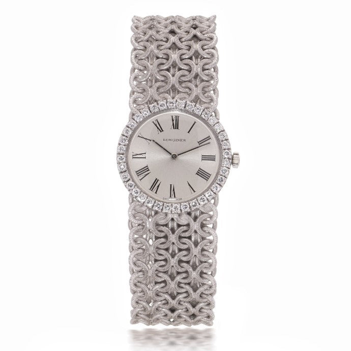 Ladies Vintage Longines 18ct White Gold Watch with Diamond Bezel on a woven design 18ct white gold strap. Circa 1970s