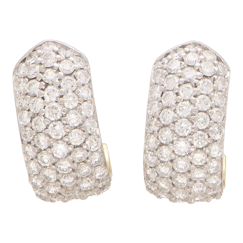 Vintage diamond hoop earrings in yellow gold.