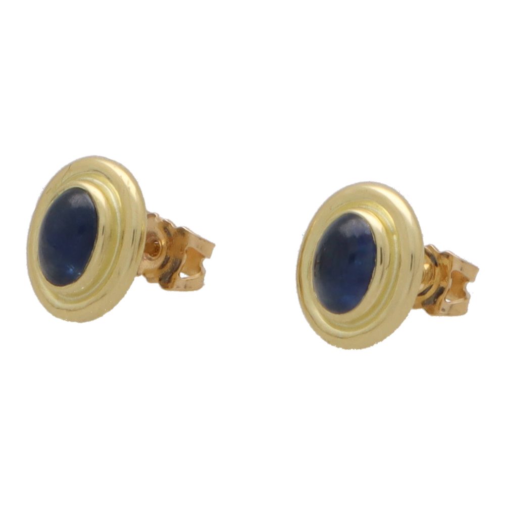 Sapphire stud earrings in yellow gold.
