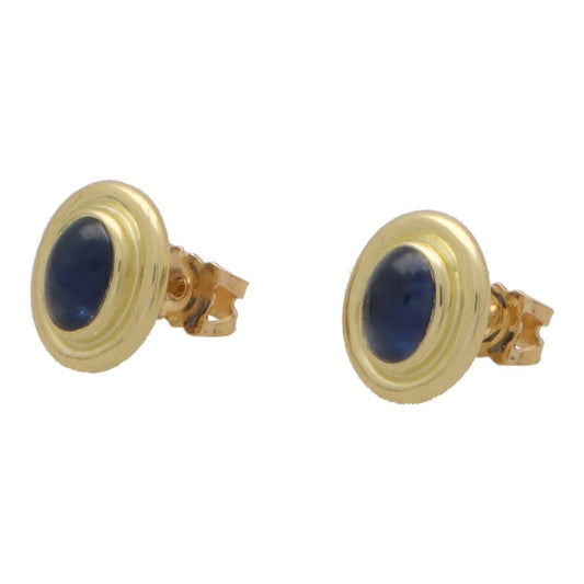 Sapphire stud earrings in yellow gold.