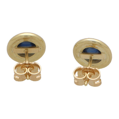 Sapphire stud earrings in yellow gold.