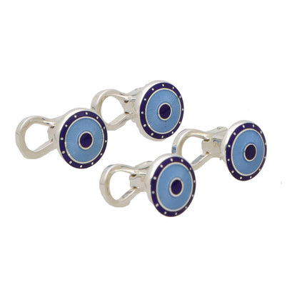 Four circular shirt studs with blue enamel faces, in a white background