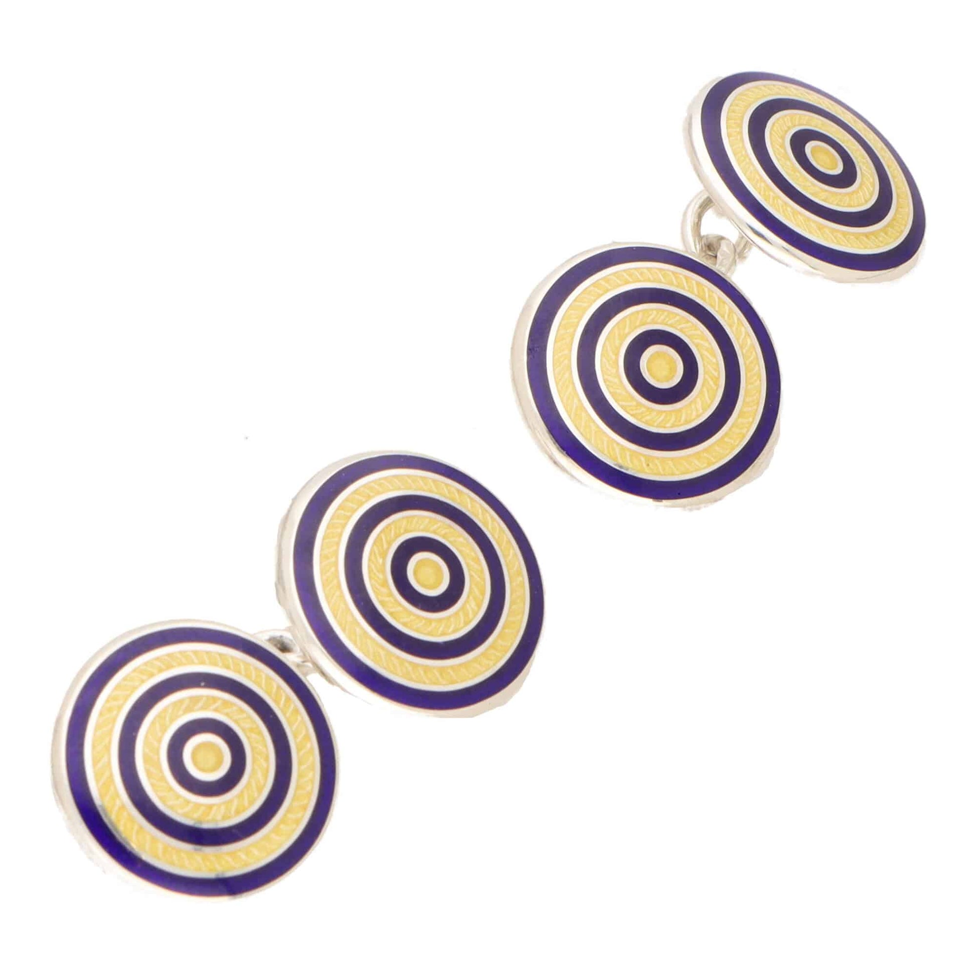 A pair of circular blue and yellow enamel cufflinks in silver, on a white background