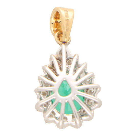 Emerald and diamond pendant in gold.
