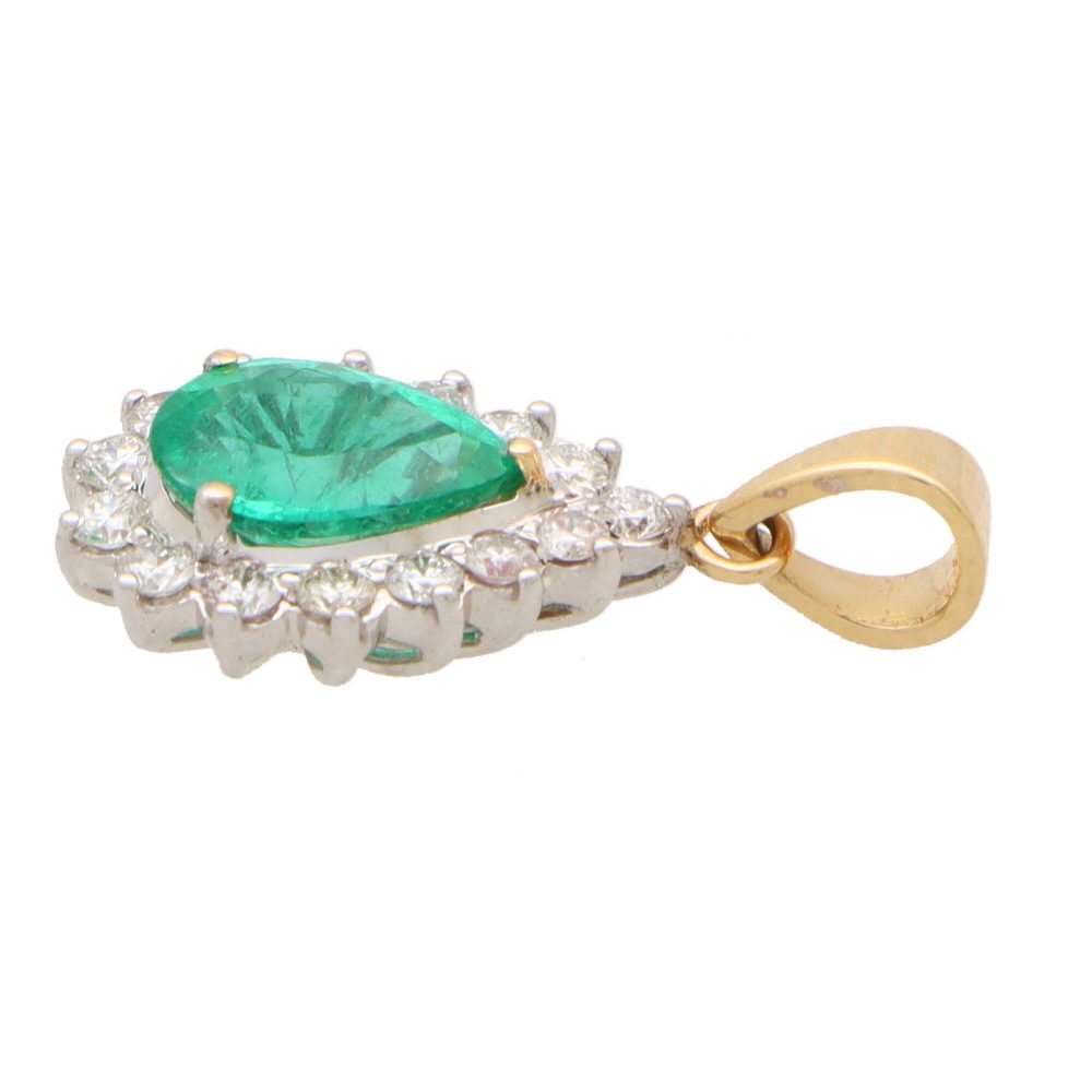 Emerald and diamond pendant in gold.