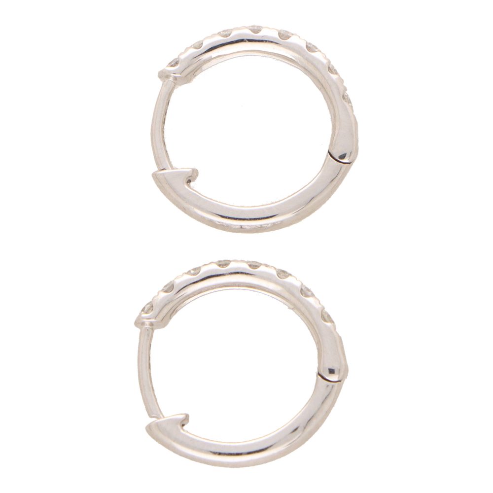 Diamond set hoop earrings in white gold.