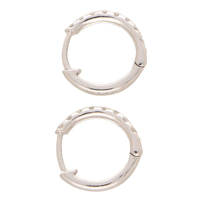 Diamond set hoop earrings in white gold.