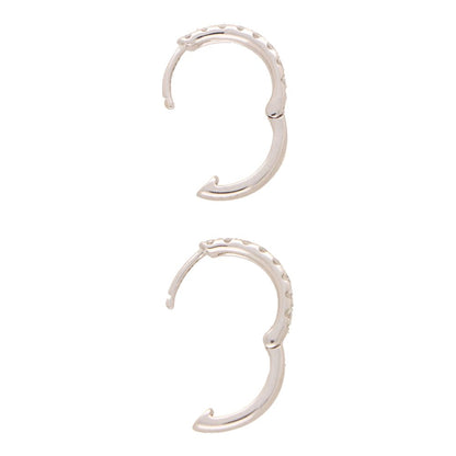Diamond set hoop earrings in white gold.