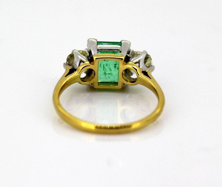 Antique Art Deco Emerald and Diamond Three Stone Ring