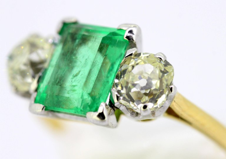 Antique Art Deco Emerald and Diamond Three Stone Ring