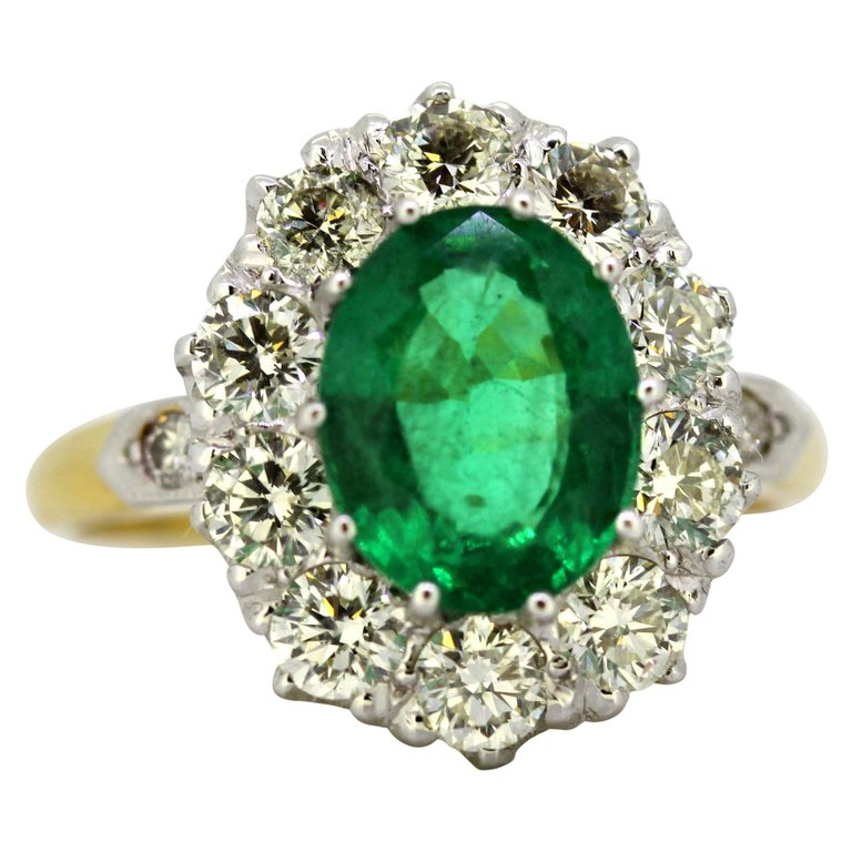 Vintage Emerald and Diamond Cluster Ring