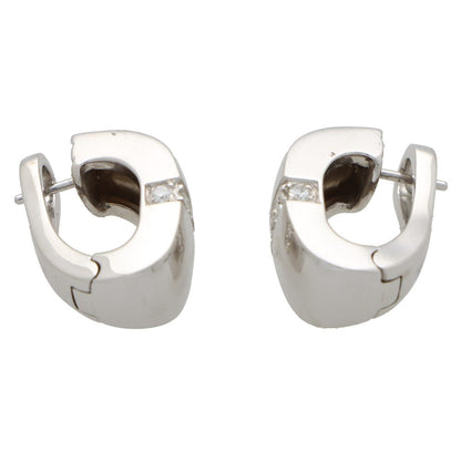 Vintage Mauboussin Paris diamond chunky huggie hoop earrings in white gold.