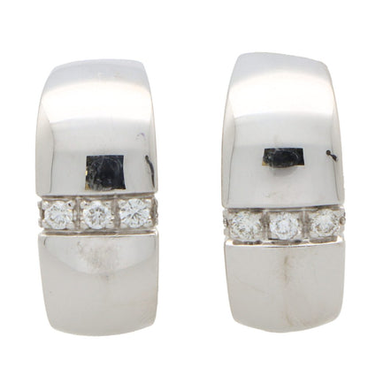 Vintage Mauboussin Paris diamond chunky huggie hoop earrings in white gold.