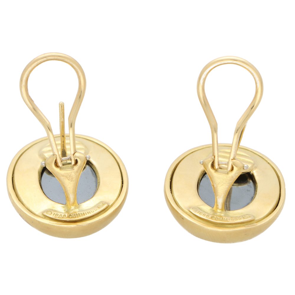 Vintage Angela Cummings hematite earrings set in yellow gold.