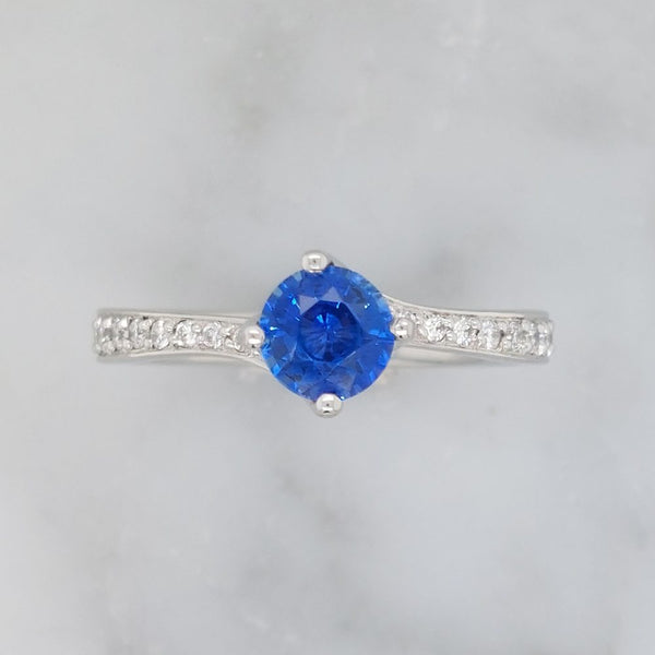 Modern 0.70ct Sapphire and Diamond Twist Setting Ring