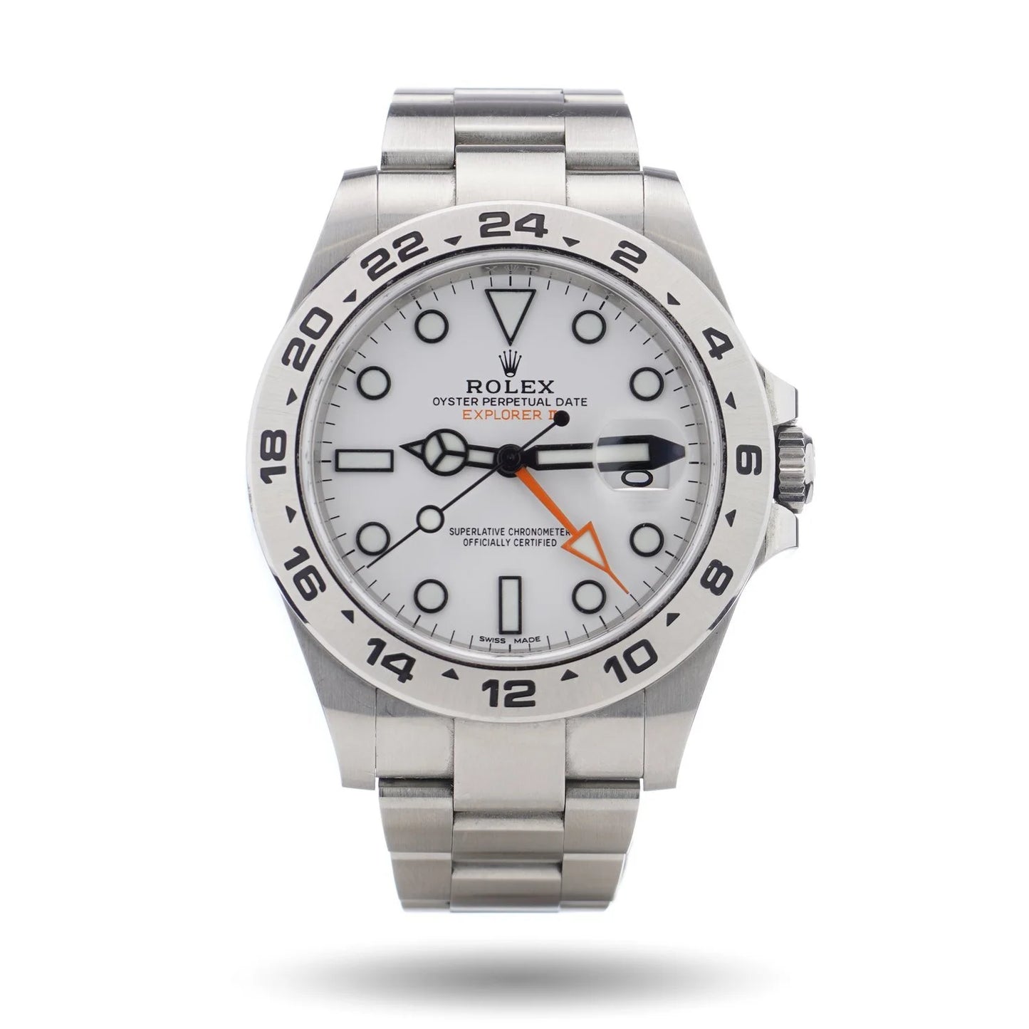A Rolex Explorer II steel wristwatch with white dial, on a white background